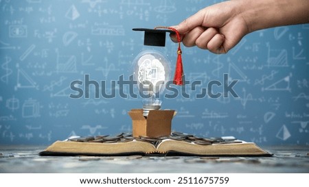 Technology education concept of e-learning. Education, Online. AI based curriculum system and digital learning. AI (Artificial Intelligence). Box with AI light bulb on pile of coins and books.