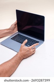 Technology in Focus: Hands Typing on a Laptop