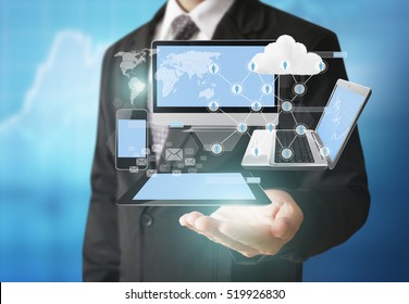 Technology in the hands of businessmen  - Shutterstock ID 519926830