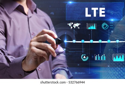 Technology, internet, business and marketing. Young business man writing word: LTE - Shutterstock ID 532766944