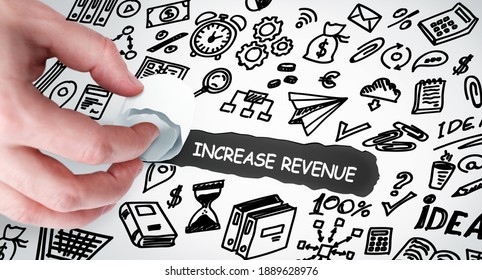 Technology, Internet and network concept. Young businessman shows the word: Increase revenue 