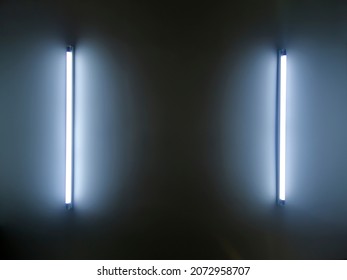 Technology light is glowing on the wall. Abstract lights lines on black background vector illustration. Easy replace use to any image. 3d render, glowing lines, tunnel, neon lights, virtual reality.