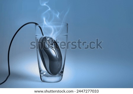  Technology mouse in a glass