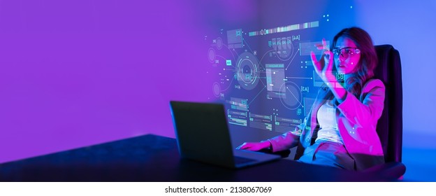 Technology on global business.Businesswoman using hologram analyzing sales data and customer shopping behavior on economic growth graph chart.Social network and Digital marketing.Business strategy pla - Shutterstock ID 2138067069