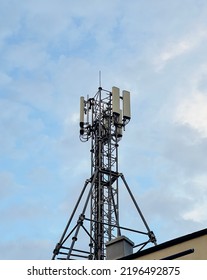 Technology On The Top Of The Telecommunication GSM (5G,4G) Tower With Copy Space.Cellular Phone Antennas On A Building Roof.Telecommunication Mast Television Antennas.Development Communication System