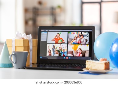 Technology And Online Communication Concept - Laptop Computer With Happy Family On Screen Having Video Call Or Virtual Birthday Party At Home