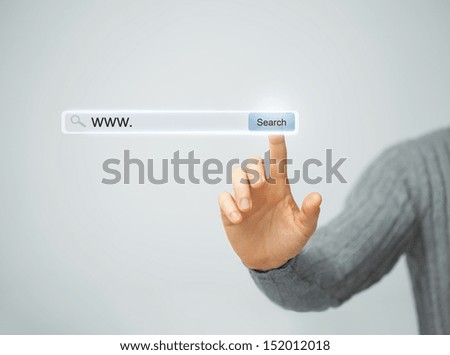 technology, searching system and internet concept - male hand pressing Search button