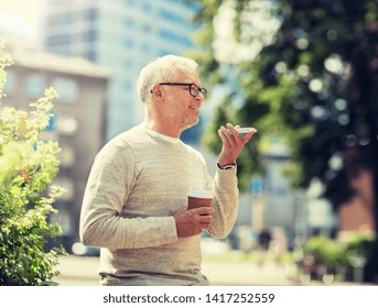 technology, senior people, lifestyle and communication concept - happy old man using voice command recorder or calling on smartphone outdoors - Powered by Shutterstock