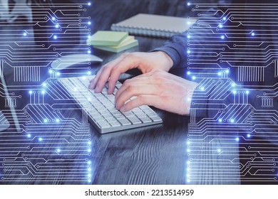 Technology Theme Hologram With Man Working On Computer On Background. High Tech Concept. Multi Exposure.