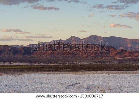 Tecopa, Inyo County, California Mojave Desert landscape including salt flats, badlands, and the Nopah Mountains Range.
