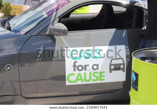 Tecumseh, Ontario, Canada – July 31 2022: Event
signs for Cars for a Cause car
show
