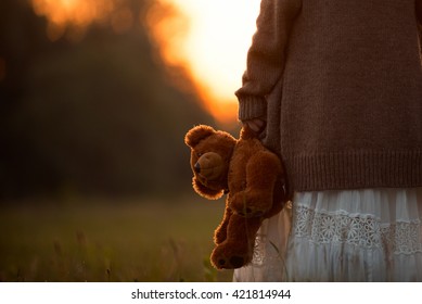 kid with teddy bear