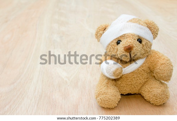 teddy bear with bandage