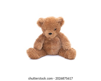 Teddy bear doll with one eye left isolated on white background.