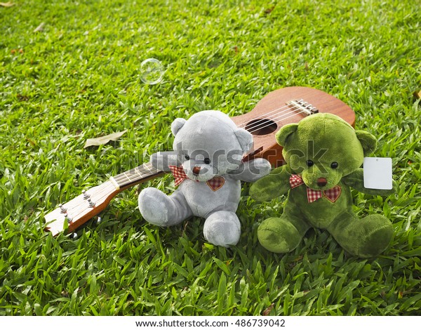 teddy bear with guitar