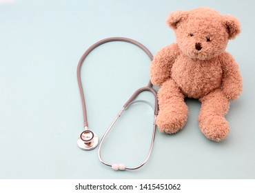 Teddy Bear Medical Equipmen twith blue background. - Powered by Shutterstock