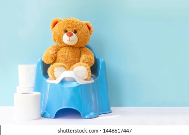 Teddy Bear On A Children's Pot; The Concept Accustom The Child To The Potty