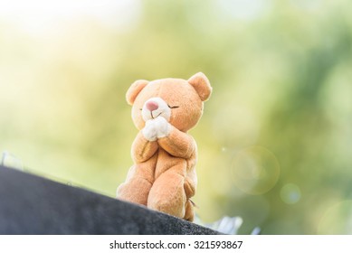 praying teddy bear