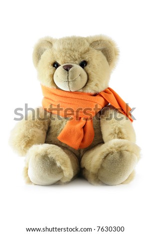 Teddy bear with scarf isolated over a white background