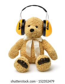 Teddy Bear Sitting With Earmuffs, Child Abuse Concept 