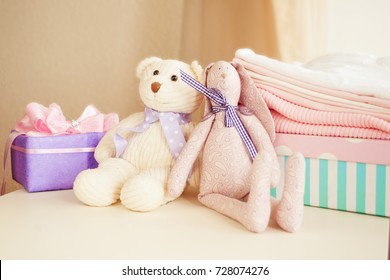 Teddy Bear Sitting On A Changing Table