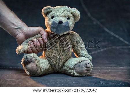 Teddy bear symbolizing a child. Child domestic violence concept