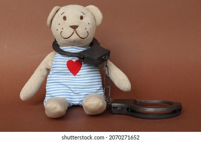 Teddy Bear Toy In Handcuffs, Kids Aggression, Aggressive Child, Children Playing Cruel Games,  Stuffed Toy Teddy Bear