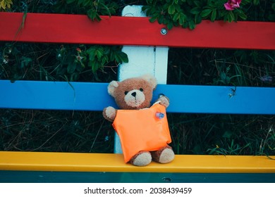 Teddy Bear Wearing Life Vest - Refugee Crisis, Children Fleeing By Boat At Sea