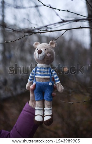 Teddybear toy knitted in the technique of knitting amigurumi