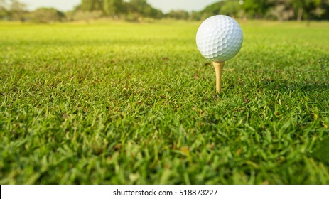 Tee Off - Golf Ball - Extreme Wide Angle View From Low Vantage Point.