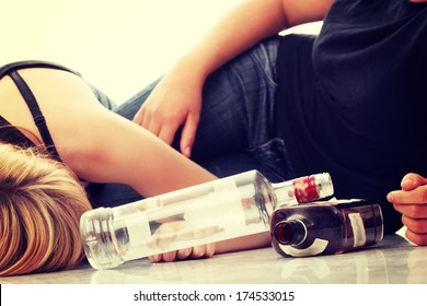 Teen Alcohol Addiction (drunk Teens With Vodka And Whisky Bottle)