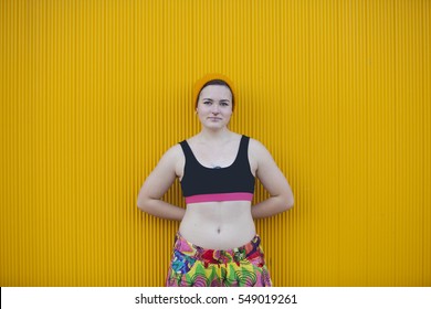 Teen Androgynous Woman On A Yellow Background 