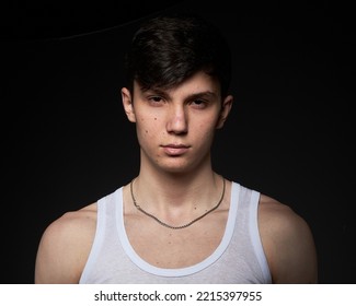 Teen Athletic Body On Dark Background.