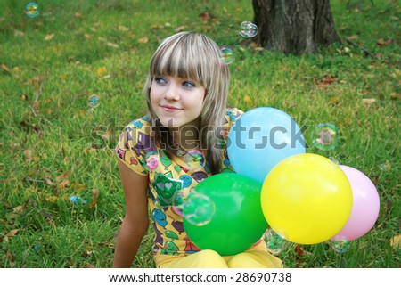 Teen with balloons