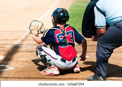 Teen Baseball Catcher During A Baseball Game.