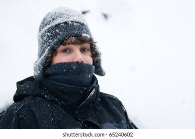 teen boy bundled up for winter weather