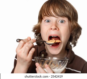 Teen boy eating cereal
