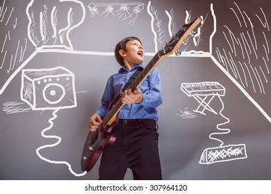 Teen Boy Playing Guitar In The Room Are Speakers Synth Rock Concert Infographics Studio Photo