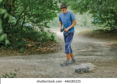 Teen Boy Playing Radio Control Car