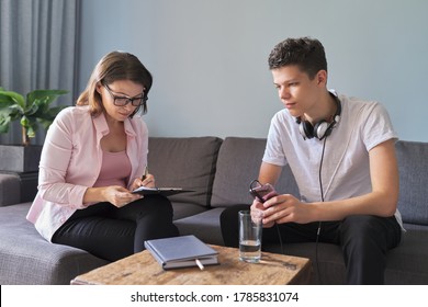 Teen Boy Talking To Professional Psychologist, Individual Therapy Session For Teenage With Doctor. Difficulties Of Adolescence, Mental Health, Social Life Of Teenager