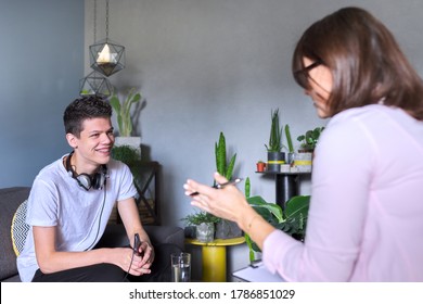 Teen Boy Talking To Professional Psychologist, Individual Therapy Session For Teenage With Doctor. Difficulties Of Adolescence, Mental Health, Social Life Of Teenager