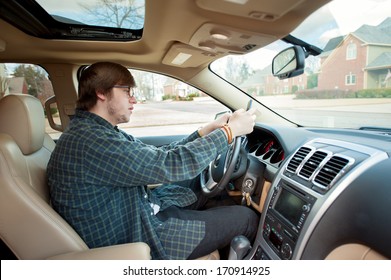 Teen Boy Texting And Driving