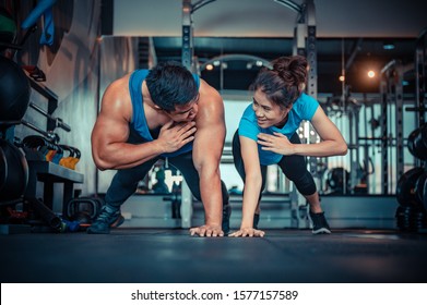 Teen Couples Exercise In The Gym