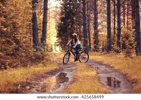 Similar – Image, Stock Photo Woman with a bike in the middle of the forest.