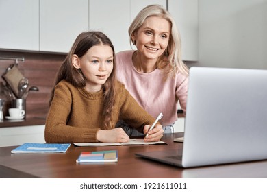 Teen Girl Distance Learning Virtual Distance Online Class On Video Call Virtual Lesson With Mother, Studying At Home Using Laptop Computer. Parent Or Tutor Helping Child Daughter With Remote Education