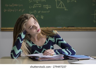 Teen Girl Distracted From Studying