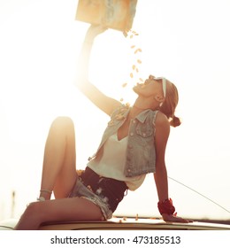 Teen Girl Eating Chips Outdoors