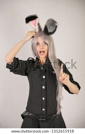 Similar – Young blonde woman wearing rabbit ears