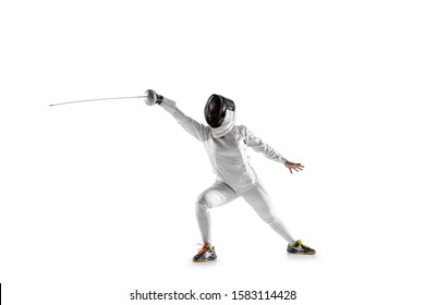 Teen girl in fencing costume with sword in hand isolated on white studio background. Young female caucasian model practicing and training in motion, action. Copyspace. Sport, youth, healthy lifestyle. - Powered by Shutterstock