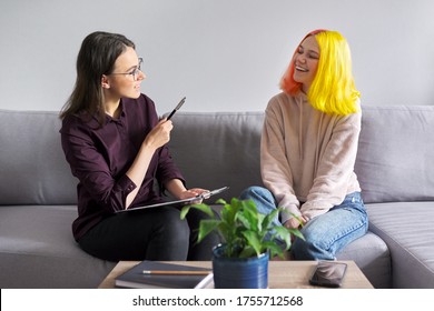 Teen Girl Giving Interview To Social Worker. School Psychologist Talking With Student, Counseling, Therapy, Help And Support For Adolescents